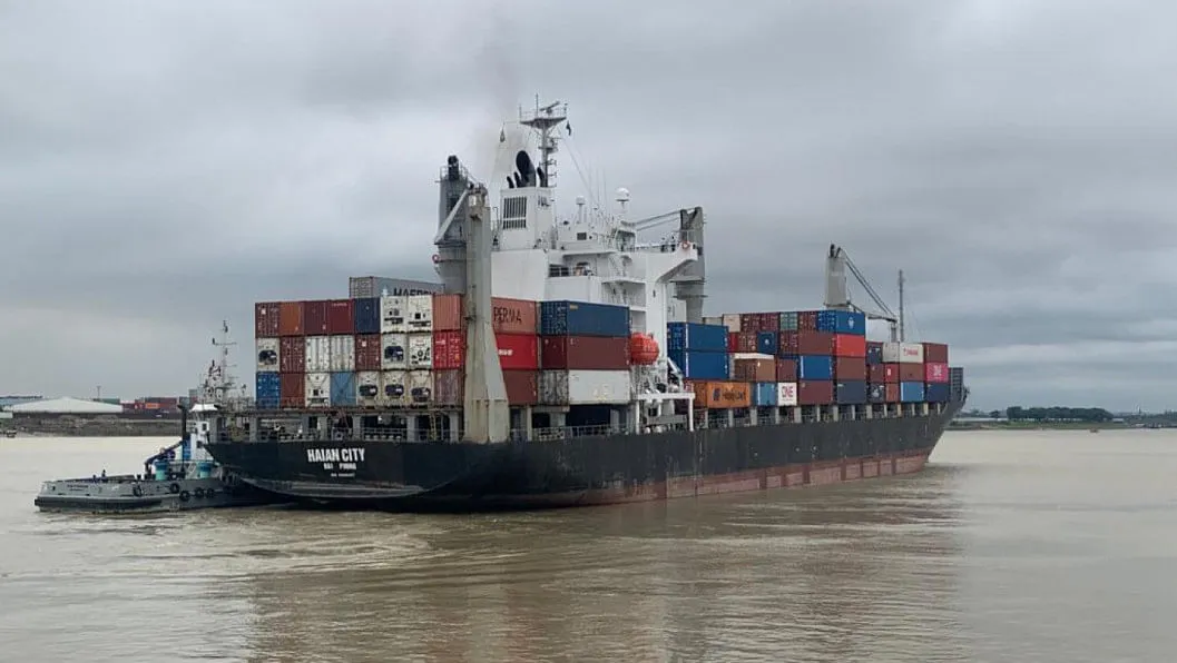Cargo ship 'Haian City' with hull damage post-collision.